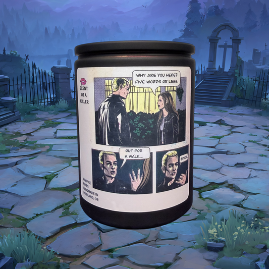 Candle with comic-style design in a graveyard setting