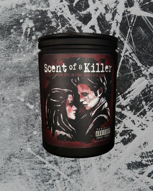 Candle with 'Scent of a Killer' twilight lion lamb record label on a textured gray background